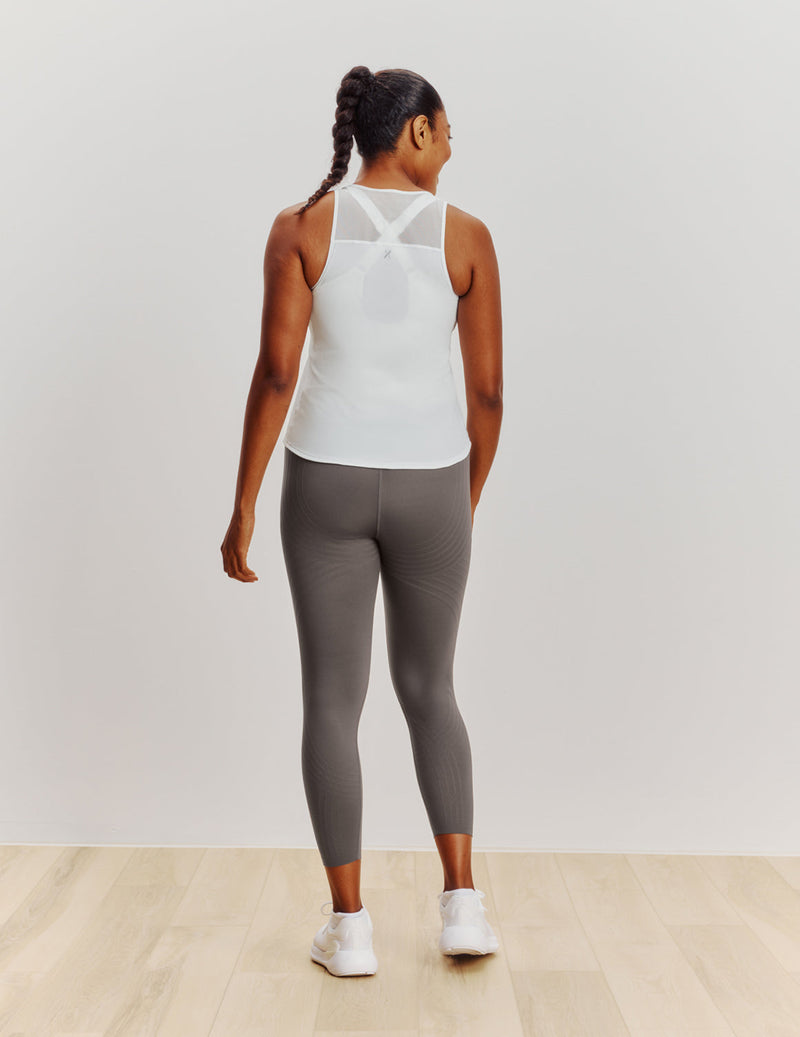 Cassaerea is a 34G and wears a Knix size M | White