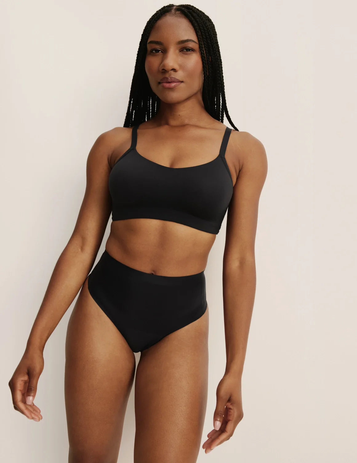 Gin has 38” hips, and wearing KNIX S | Black