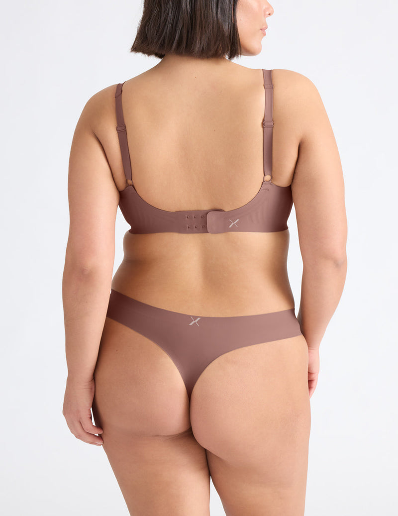 Maya is a 34F and wears a Knix size M++ | Sola