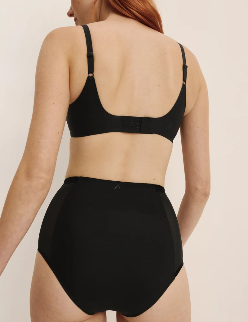 Molly has 35.5” hips, and wearing KNIX S | Black