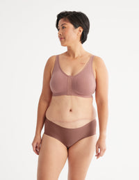 Denise is a customer and wears a Knix size M | Bisque