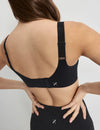 Sofia is 32D and wears a Knix size S+ | Black