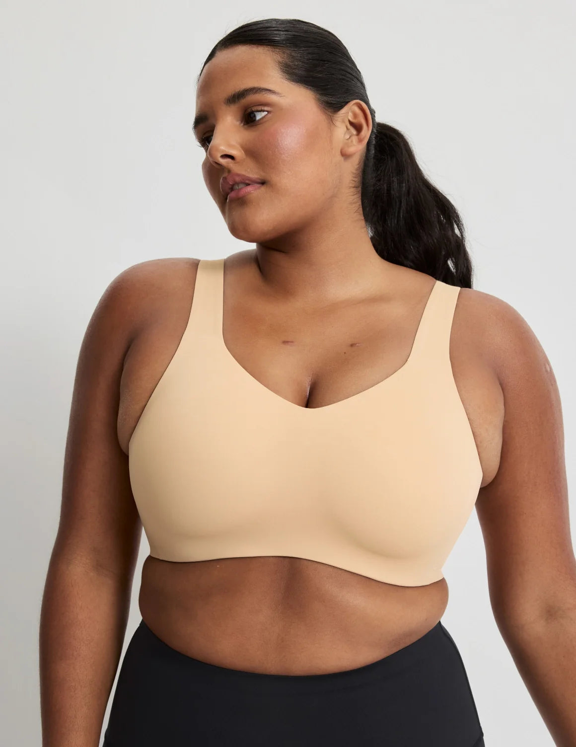 Adiya is a 36C and wears a Knix size L  | Warm Sand