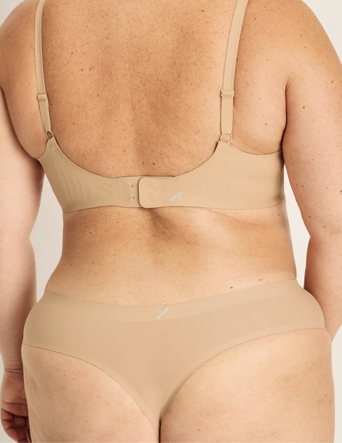 Clementine has 51” hips, and wearing KNIX XXL | Warm Sand