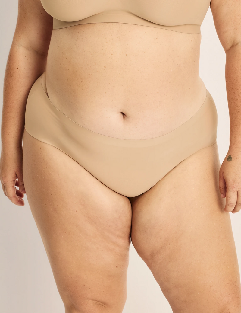 Clementine has 51” hips, and wearing KNIX XXL | Warm Sand