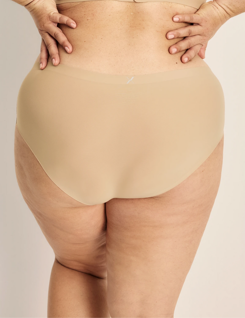 Clementine has 51” hips, and wearing KNIX XXL | Warm Sand