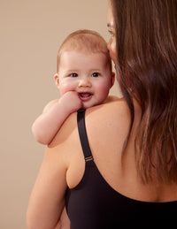 Andrea is a 32G, she wears a Knix size S+ | Black