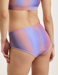 Back view of model wearing the Teen Period Swim Full-Coverage Bikini Bottom highlighting the coverage and fit