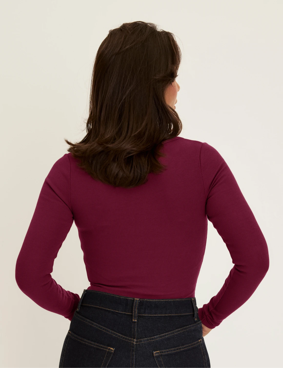 Maya is a 34DDD wearing KNIX M | Back view of model wearing the SculptRib™ Cotton Long Sleeve Top highlighting the neckline, fabric and hugging fit | Mulberry