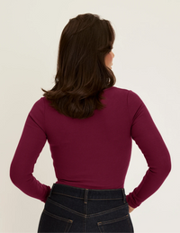 Back view of model wearing the SculptRib™ Cotton Long Sleeve Top highlighting the neckline, fabric and hugging fit