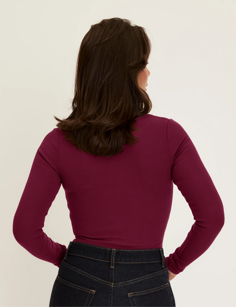 Back view of model wearing the SculptRib™ Cotton Long Sleeve Top highlighting the neckline, fabric and hugging fit