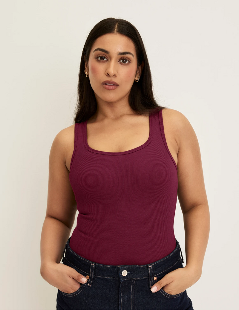 Front view of model wearing the SculptRib™ Cotton Tank highlighting the neckline, fabric and hugging fit
