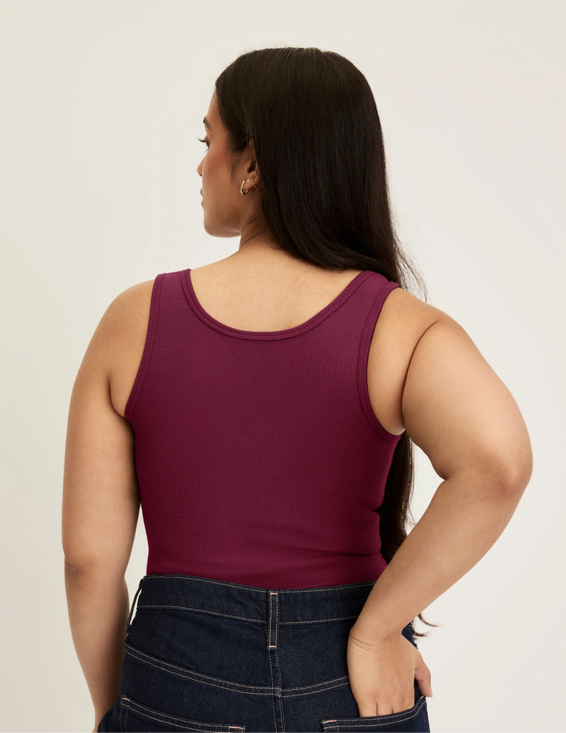 Back view of model wearing the SculptRib™ Cotton Tank highlighting the neckline, fabric and hugging fit