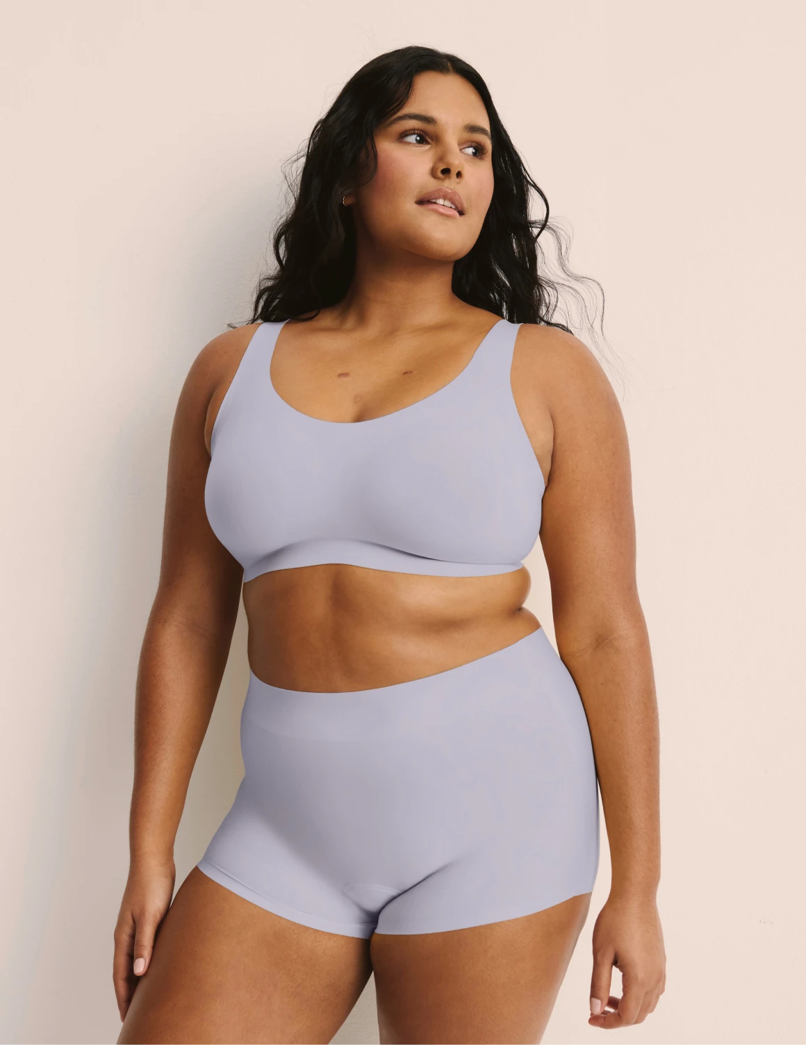 Adiya is a 36C and wearing KNIX L | Lavender