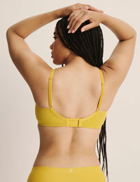 Abigail is a 34DD and is wearing a Knix size M+  | Honey