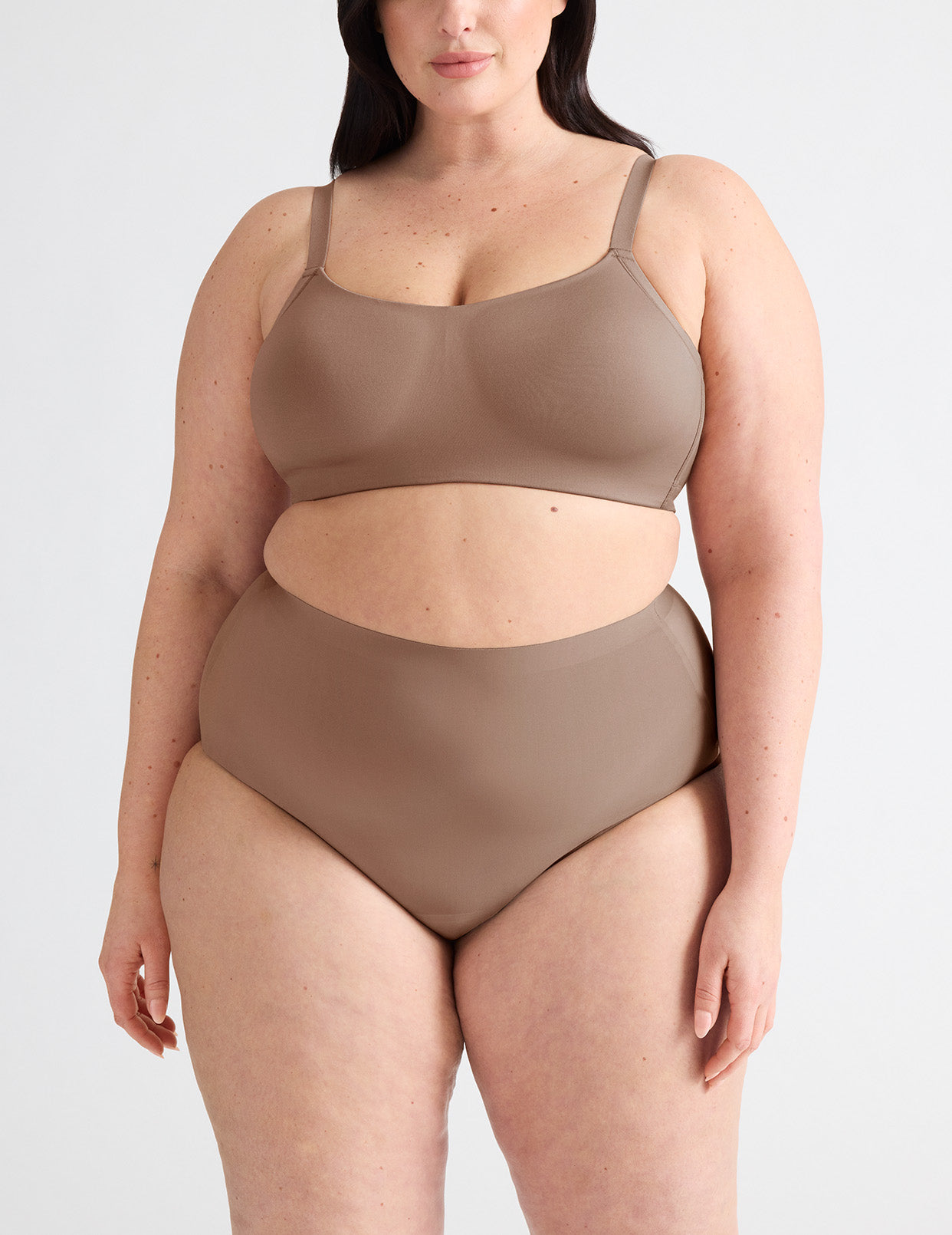 Gabrielle has 48” hips and wears a Knix size XXL | Mushroom