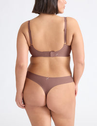 Maya is a 34F and wears a Knix size M++ | Sola