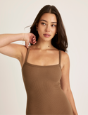 Alexandra is 5’8.5” tall and wearing KNIX S | Bark
