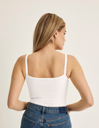 Sarah is a 34DD wearing KNIX M | White