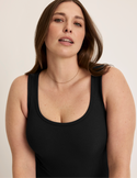 Beatrice is 5’7.5” tall and wearing KNIX XL | Black