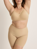 Beatrice is wearing KNIX XL | Warm Sand