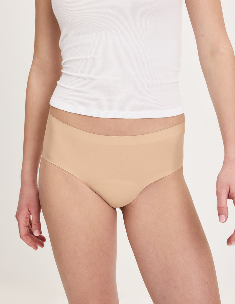 Front view of model wearing the Teen Super Leakproof® No-Show Boyshort highlighting the coverage and smooth fit