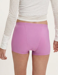 Back view of model wearing the Teen SuperPlus Leakproof® Sleepover Short highlighting the coverage and smooth fit