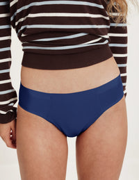 Front view of model wearing the Teen SuperPlus Leakproof® No-Show Bikini highlighting the coverage and smooth fit