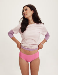 Front view of model wearing the Teen Super Leakproof® No-Show Boyshort highlighting the coverage and smooth fit