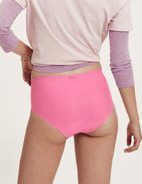 Back view of model wearing the Teen Super Leakproof® No-Show Boyshort highlighting the coverage and smooth fit