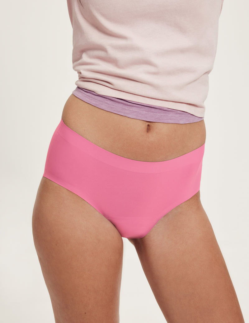 Front view of model wearing the Teen Super Leakproof® No-Show Boyshort highlighting the coverage and smooth fit