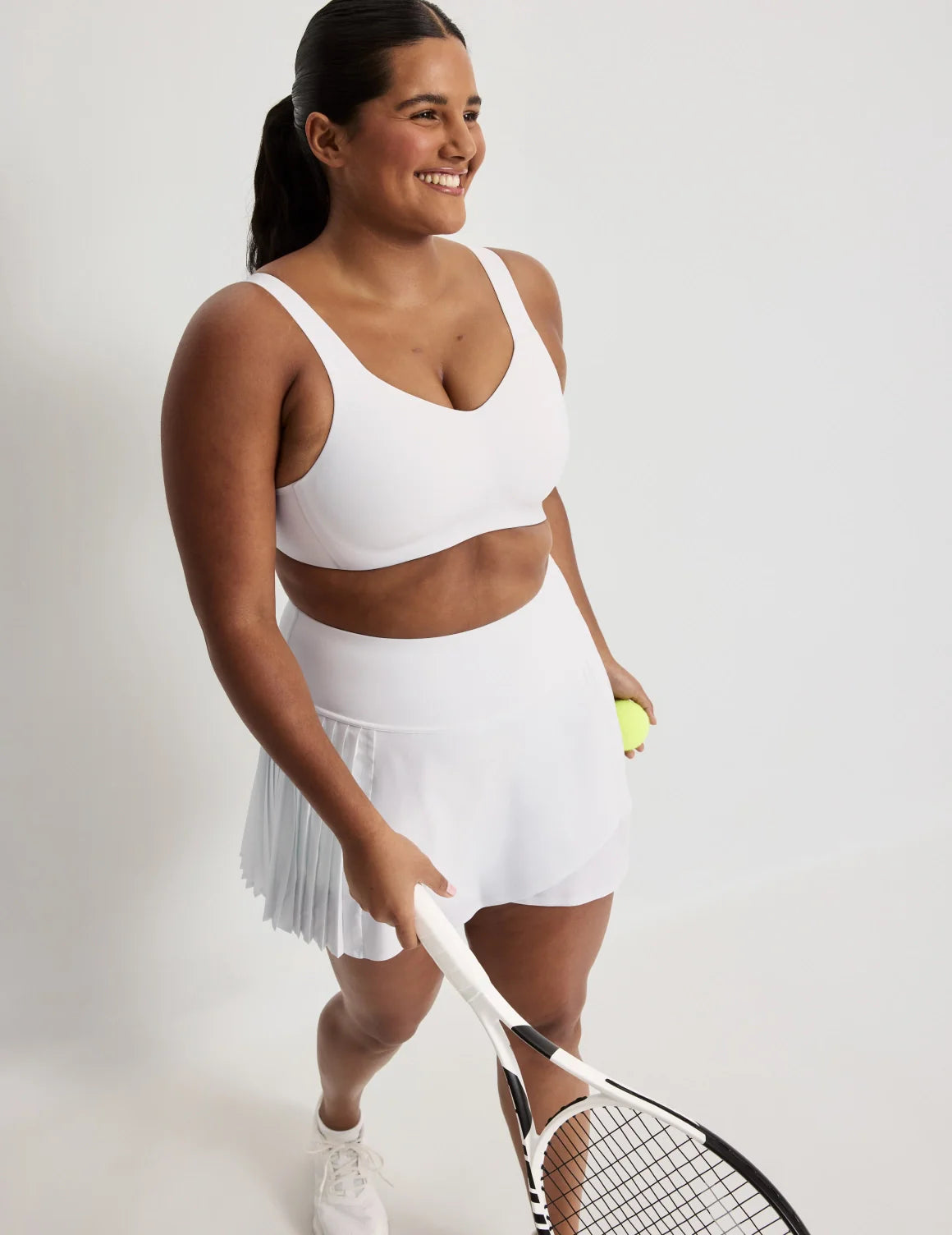 Adiya has 40” hips and wears a size L | White