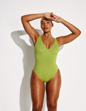 Amber is 5’10.5”, a 36C, has 44” hips and wears a Knix size L | Chartreuse
