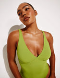 Amber is 5’10.5”, a 36C, has 44” hips and wears a Knix size L | Chartreuse