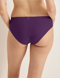 Back view of model wearing the Leakproof UltraThin No-Show Bikini highlighting the coverage and smooth fit
