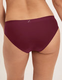 Megan has 36.5” hips and wearing KNIX S | Dark Cherry