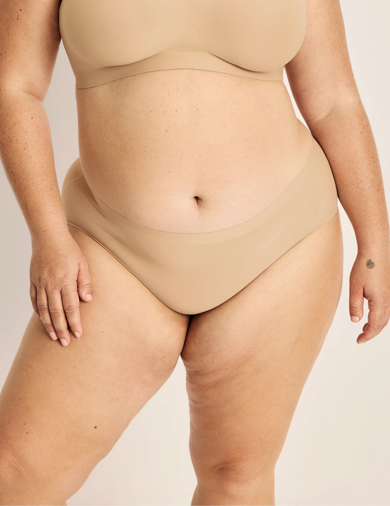 Clementine has 51” hips, and wearing KNIX XXL | Warm Sand