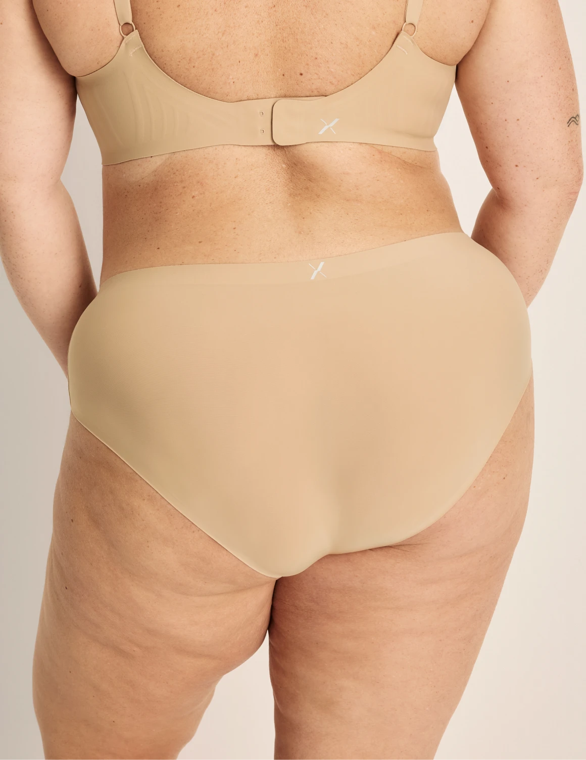 Clementine has 51” hips, and wearing KNIX XXL | Warm Sand