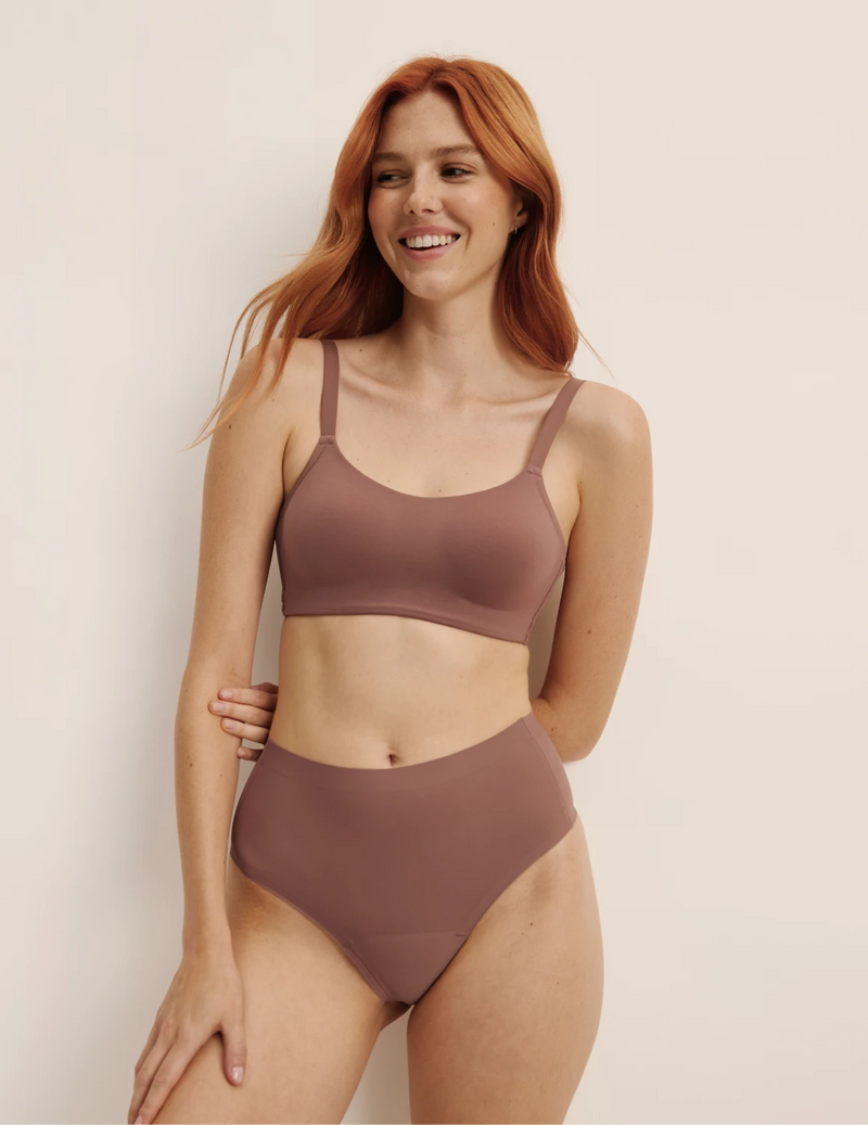 Molly has 35.5” hips, and wearing KNIX S | Sola
