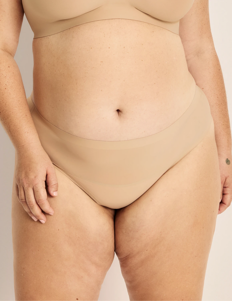 Clementine has 51” hips, and wearing KNIX XXL | Warm Sand
