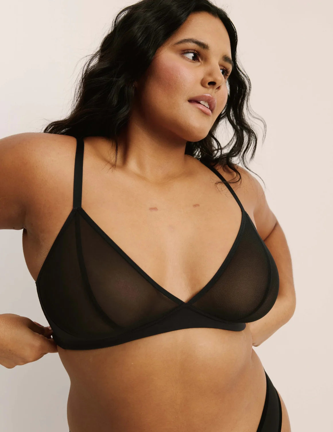 Adiya is a 36C and wearing KNIX L  | Black