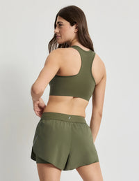 Sofia is 32D and wears a Knix size S+  | Olive
