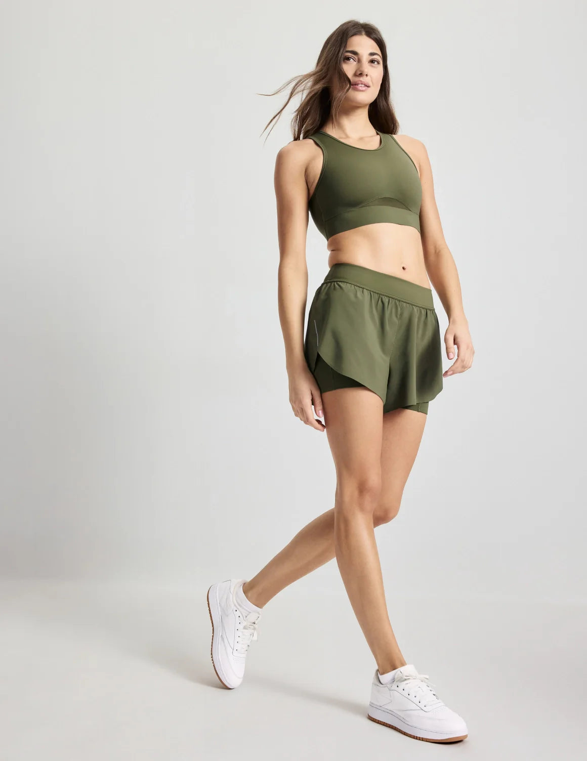 Sofia is 32D and wears a Knix size S+  | Olive