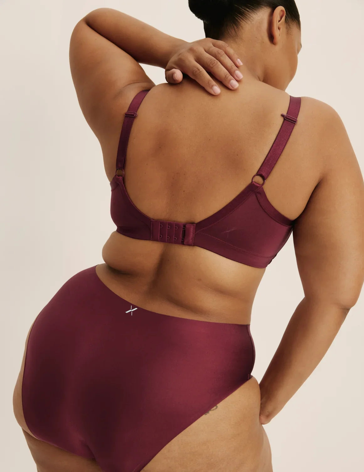 Leslie is a 38D and wearing KNIX XL+  | Dark Cherry Shimmer
