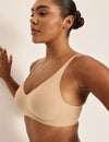 Amber is a 36C and wearing KNIX L  | Warm Sand