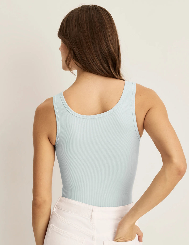 Back view of model wearing the SculptRib™ Cotton Tank highlighting the neckline, fabric and hugging fit