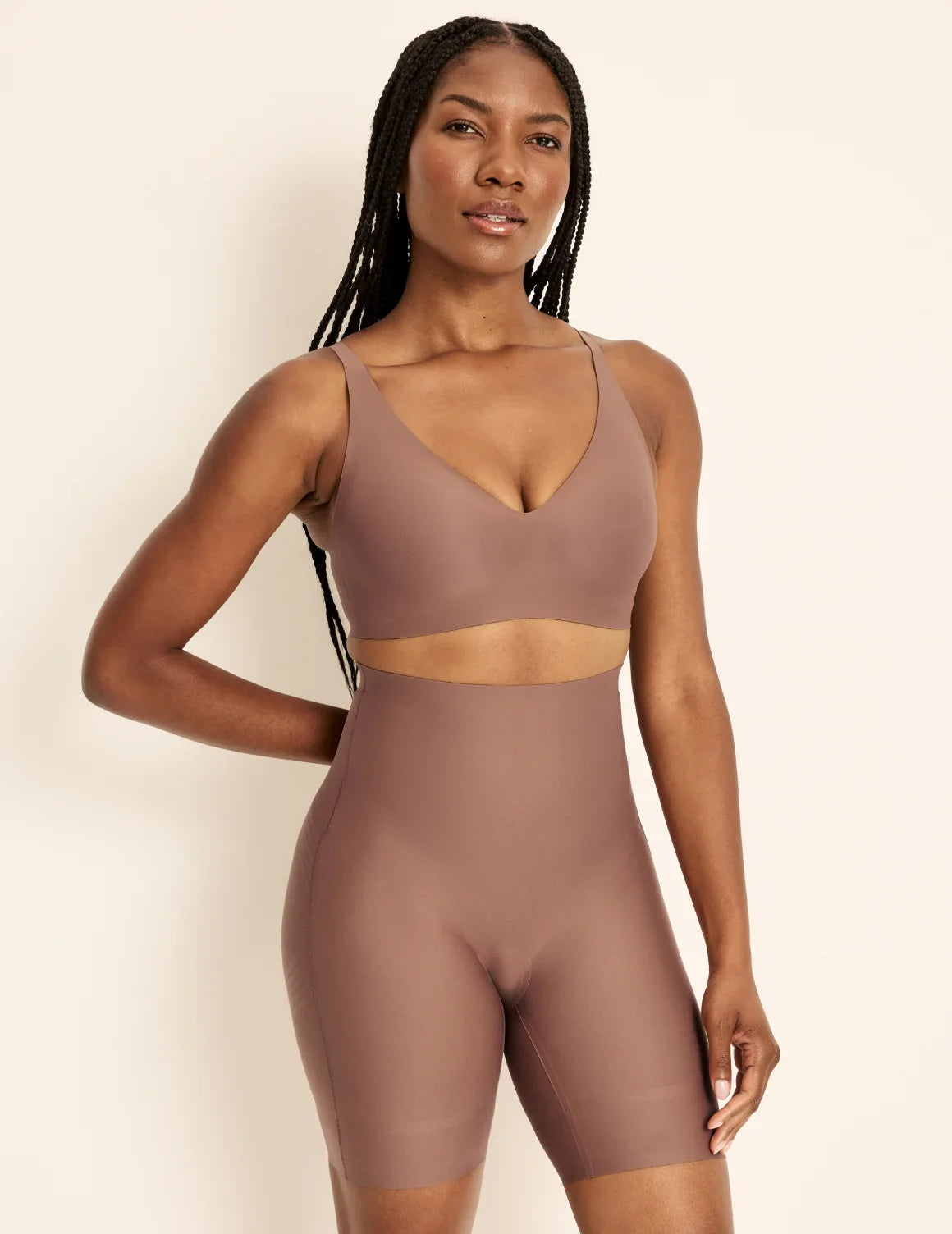 Gin has 38” hips, is 5’8” tall and wears a size S  | Front view of model wearing the Customizable Shaper High Rise Leakproof Shorts, highlighting the coverage and smooth fit | Sola