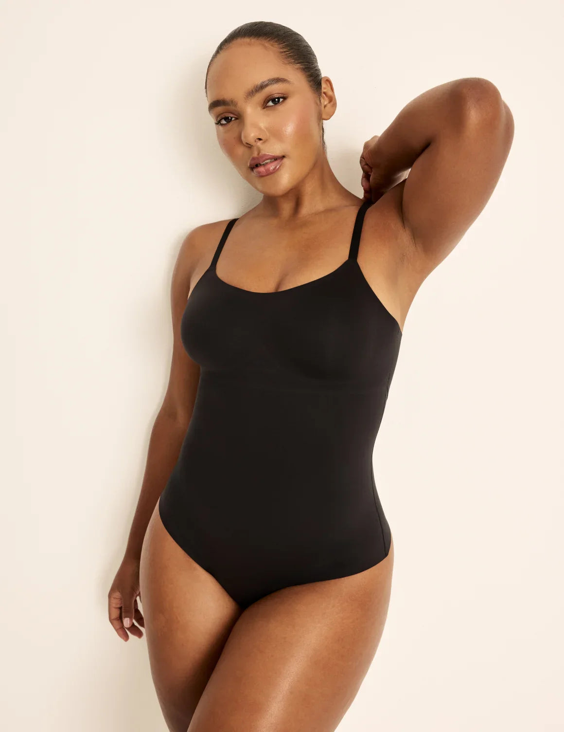Amber is a 36C, has 46” hips, is 5’10.5” tall and wears a size L | Black