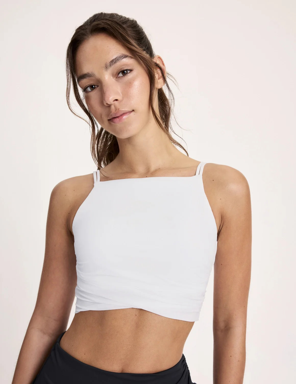 Maya is a 32A and wearing KNIX S | White