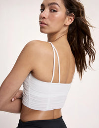 Maya is a 32A and wearing KNIX S | White